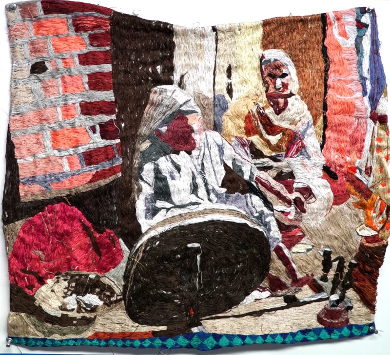 Textile work by Jagdeep Raina depicting two figures in tones of brown, pink, brick red, beige and pale yellow