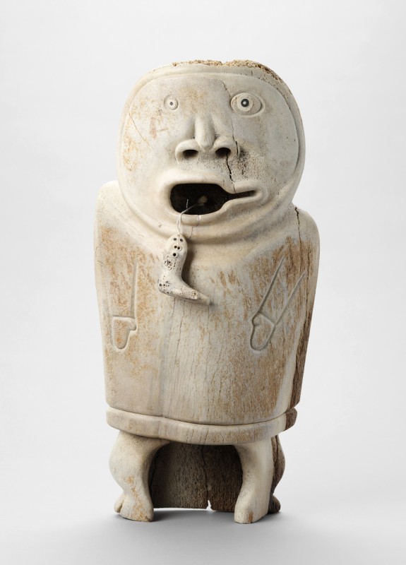 Figure with large mouth with a spirit hanging out 
