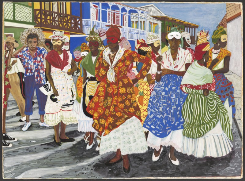 Group of figures dressed in bright colours on the street lined with colonial styled buildings