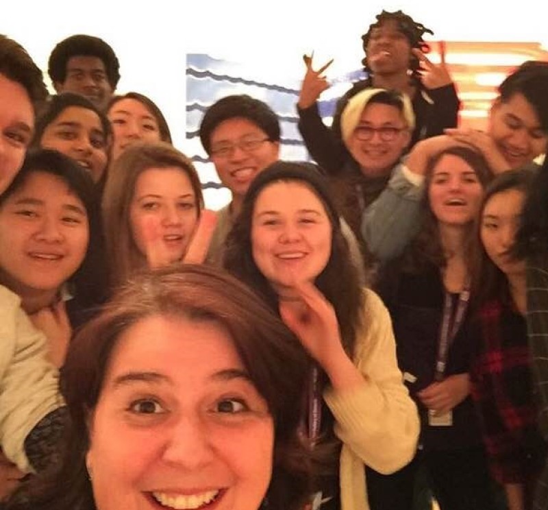 A selfie taken by Sarah Febbraro and a crowd of youth behind her