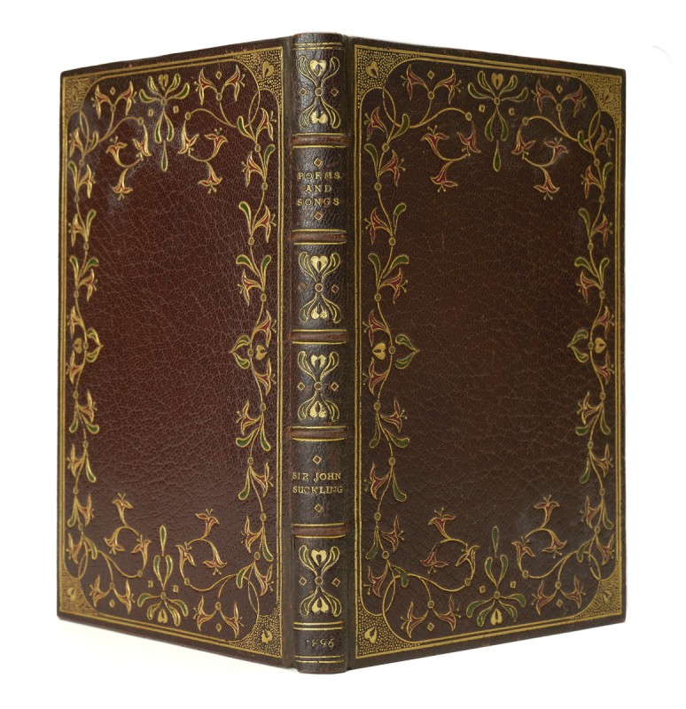 image shows the gilded spine of a leather bound book