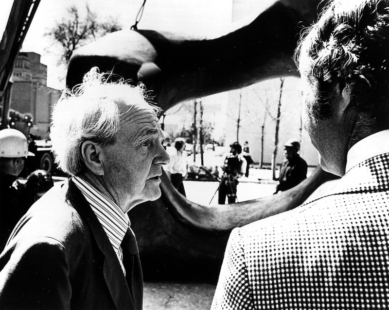 Henry Moore in profile and William Withrow standing in front of Large Two Forms. 