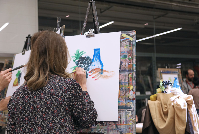 Artmaking by a student drawing a still life in an expressive manner