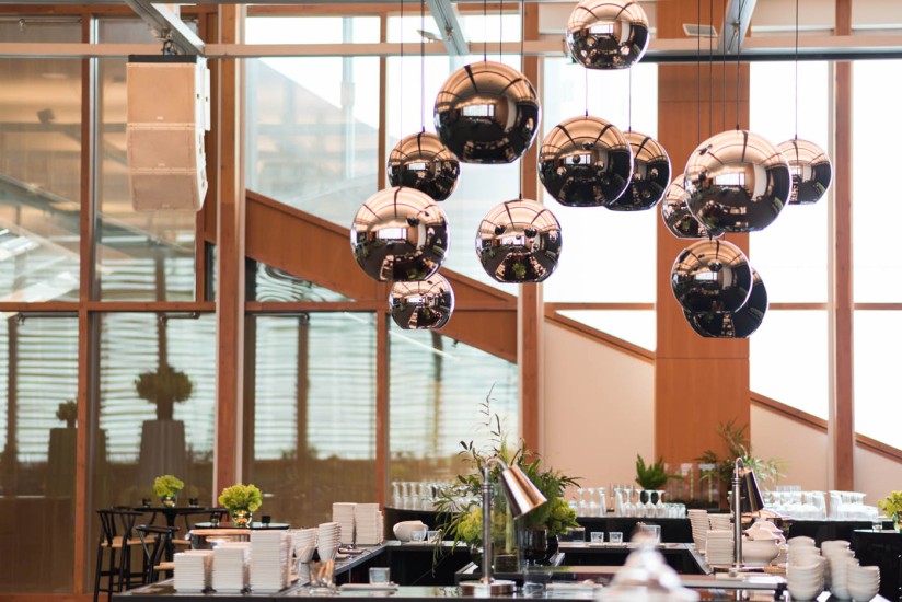 mirrored balls hanging over bar in Baille Court
