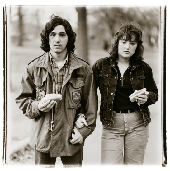 Diane Arbus, A young man and his girlfriend with hot dogs in the park, N.Y.C., 1971