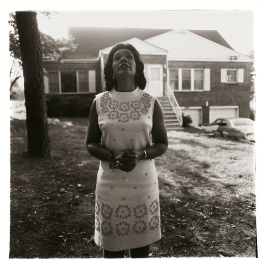Diane Arbus. Mrs. Martin Luther King, Jr. on her front lawn, Atlanta, Ga., 1968