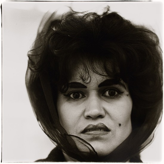 Diane Arbus, Puerto Rican woman with a beauty mark, N.Y.C., 1965. Gelatin silver print, sheet: 50.8 x 40.6 cm. Art Gallery of Ontario. Gift of Phil Lind, 2016. Copyright © Estate of Diane Arbus.