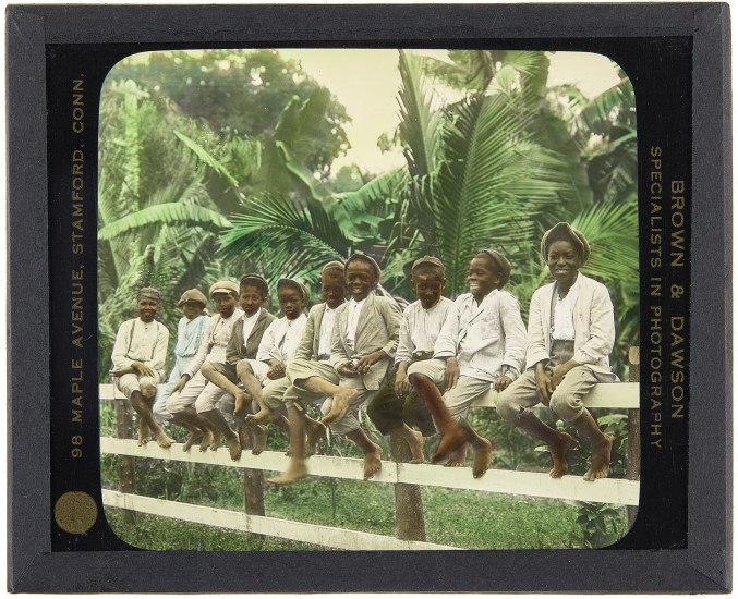 Jamaican Boys, around 1900. Lantern slide: hand-painted gelatin silver on glass.