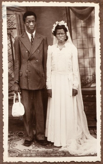 Wedding Portrait from Album of Adults and Children Posing in Their Local Costumes, Nigeria, Africa