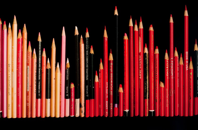 Sarindar Dhaliwal, Southall: Childplay (detail). Digital chromira print of red and pink coloured pencils lined up.