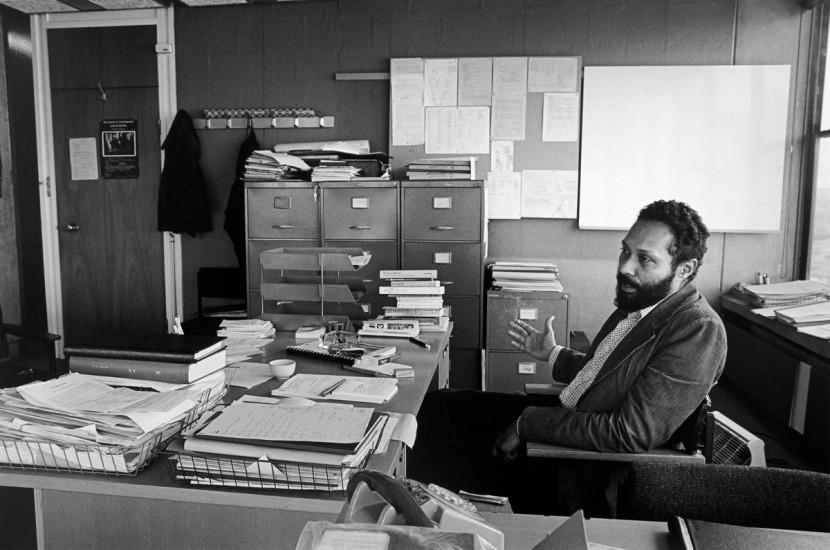 Vanley Burke. Professor Stuart Hall in his Office at Birmingham University, School of Cultural Studies, 1975, printed 2023. Gelatin silver print