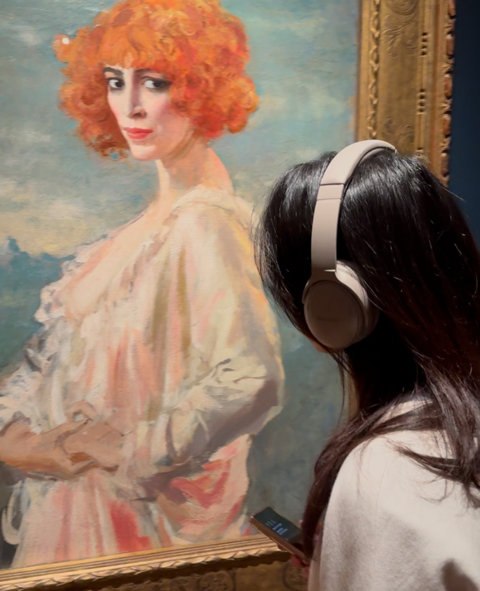 person wearing headphones looking at Marchesa Casati painting